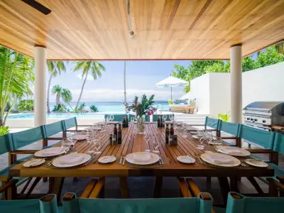 Comedor Exterior Amilla Maldives Resort And Residences