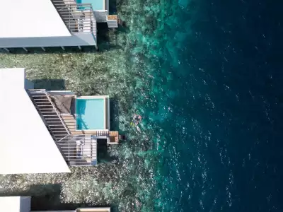 Reef Water Pool Villa Vista aerea Amilla Maldives Resort And Residences