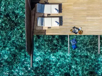 Sunset Over Water Villa with Pool Exterior The St. Regis Maldives Vommuli