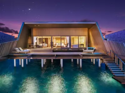Sunset Over Water Villa with Pool Atardecer The St. Regis Maldives Vommuli